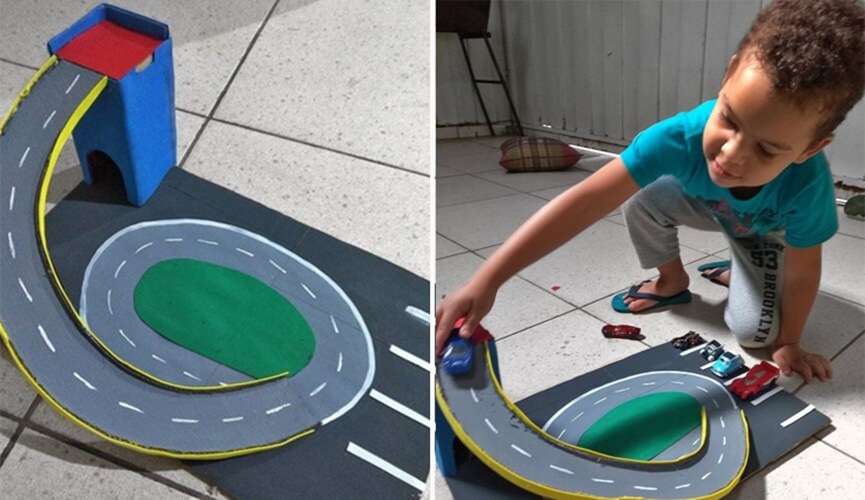 Sem dinheiro, mãe usa criatividade e constrói pista de papelão para filho brincar