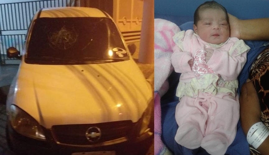 Carro destruído, à direita; bebê menina, à esquerda