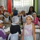 Foto de crianças cozinhando durante oficina em Campo Limpo Paulista