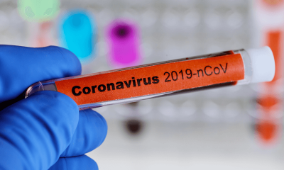 Tubo de sangue com coronavírus escrito