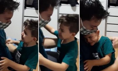 Foto de pai e filho se abraçando