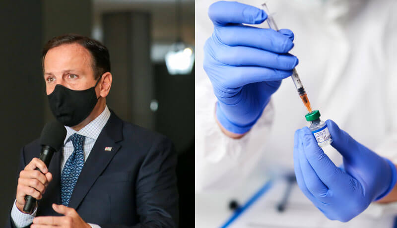 Doria em coletiva; pesquisador usa seringa para tirar vacina de frasco