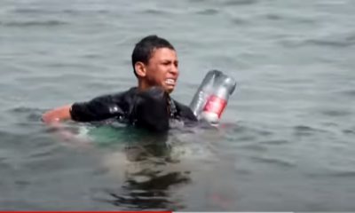 Jovem migrante chega à praia flutuando em garrafas plásticas