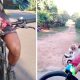 Ciclista com cachorro em guidão de bicicleta
