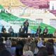 Evento do 7º Conexidades 2024, com uma grande plateia assistindo a uma apresentação no palco do prefeito de Jundiaí.